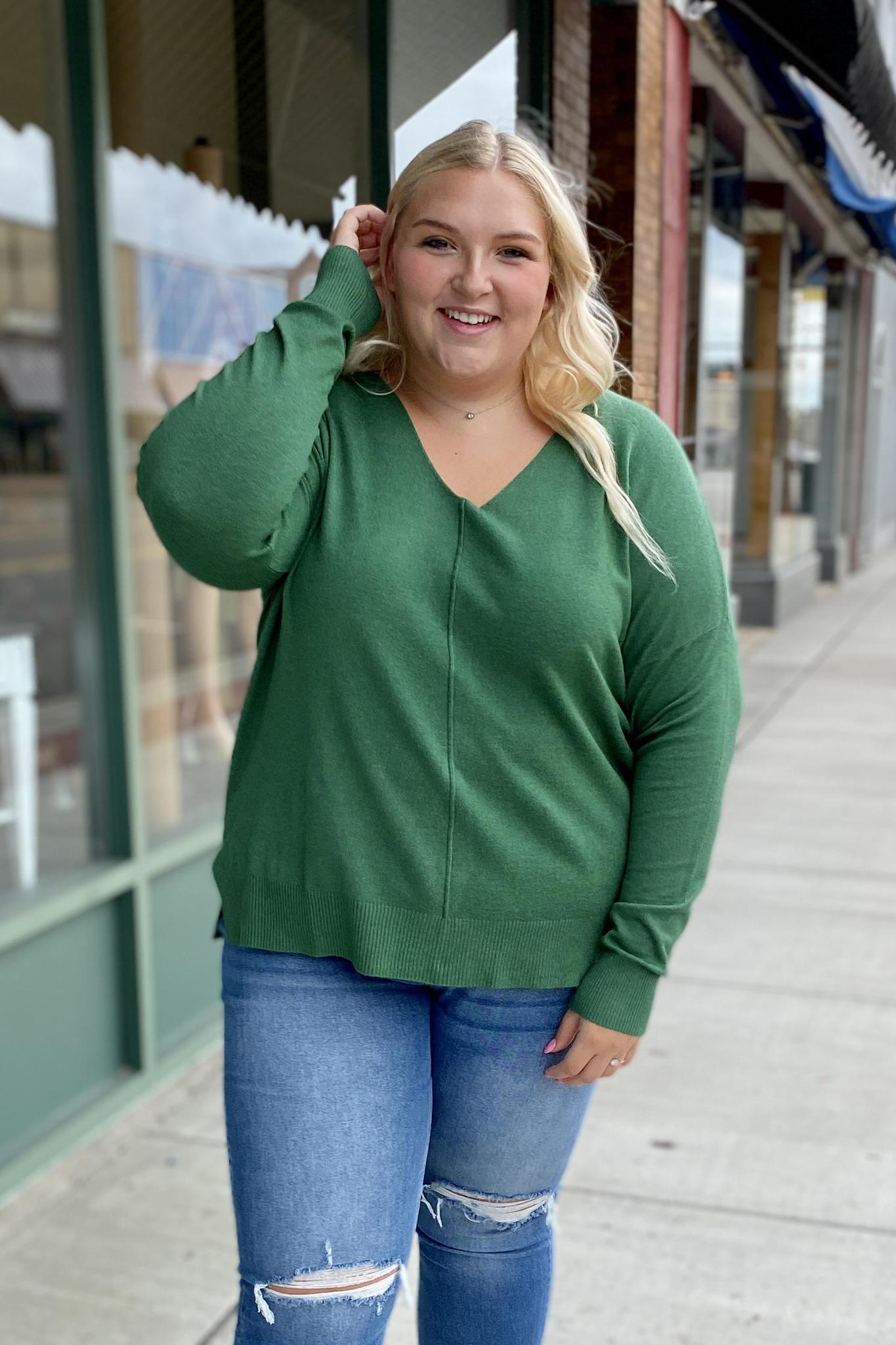 Dark green hot sale sweater outfit